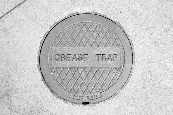 grease trap pumping helps to prevent foul odors, backups, and costly repairs in plumbing systems
